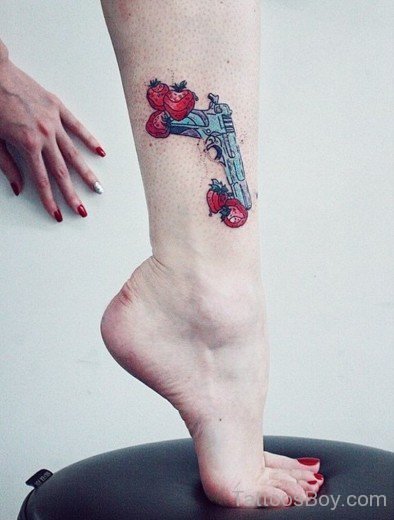 Gun Tattoo On Ankle