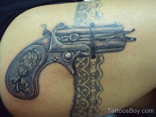 Gun Tattoo On Thigh