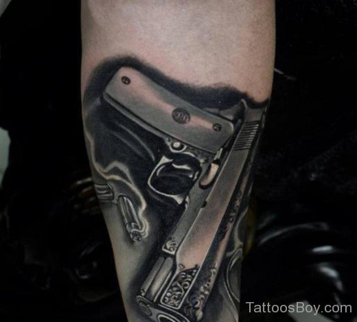 Gun Tattoo On Wrist
