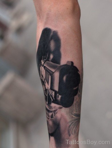 Gun Tattoo On Wrist