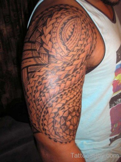 Impressive Maori Tribal Tattoo On Bicep-TB1073