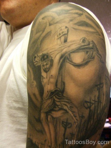 Jesus Tattoo On Bicep 