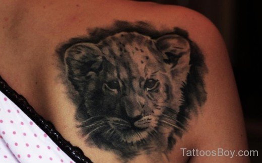Lion Face Tattoo On Back 