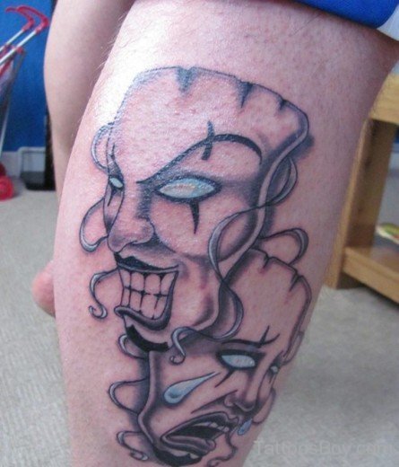 Mask Tattoo On Thigh