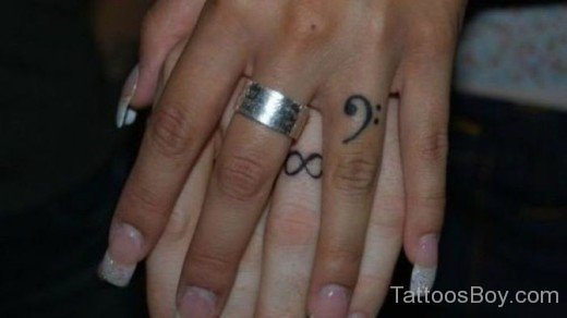 Musical Note Tattoo On Finger-TB135