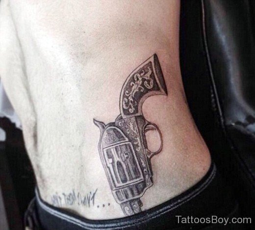 Old Gun Tattoo On Waist