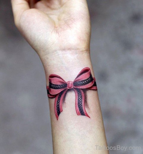 Red Bow Tattoo On Wrist