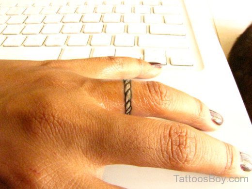 Wedding Ring Tattoo | Ring tattoos, Ring tattoo designs, Wedding ring  finger tattoos