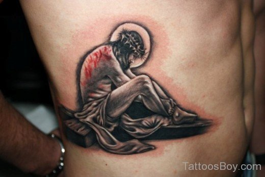 Sitting Jesus Tattoo On Rib-TB14157
