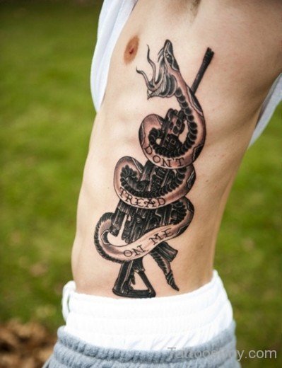 Snake And Gun Tattoo On Rib-TB1103