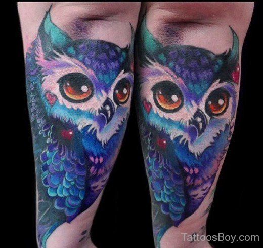 Blue Owl Tattoo On Elbow