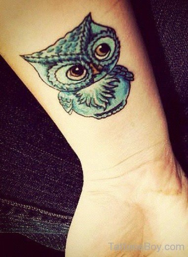 Blue Owl Tattoo On Wrist
