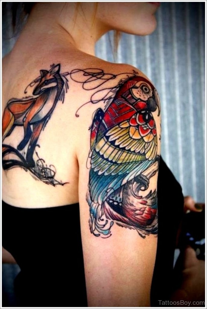 Small shoulder tattoo. wave contained partly in a heart. VERY small bird.  Vivid colors. tattoo idea | TattoosAI