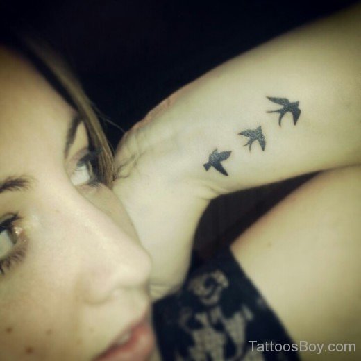 Flaming Bird Tattoo On Arm