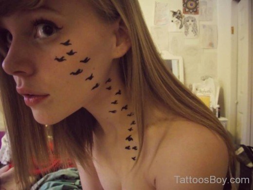 Outstanding Birds Tattoo On Face-TB14078