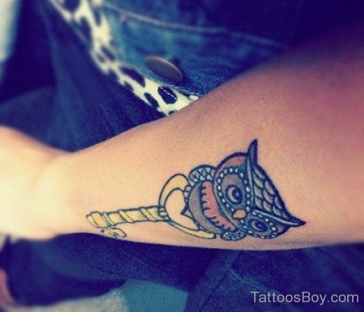 Owl Holding Key Tattoo