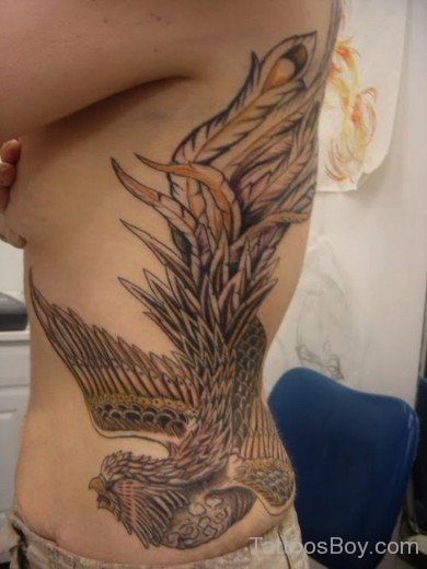 Phoenix Tattoo On Rib 
