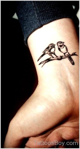 Small Bird Tattoo On Wrist