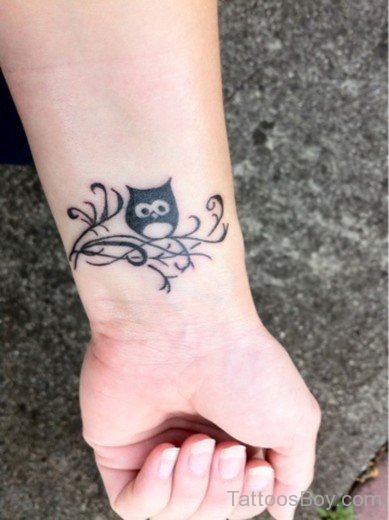 Small Owl Tattoo On Wrist